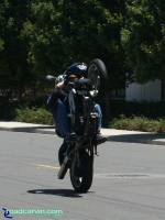 Suzuki SV650 - 12 O'Clock Wheelie: 12 o'clock? This Suzuki SV650 rider shows great control riding high without a 12 o'clock bar.